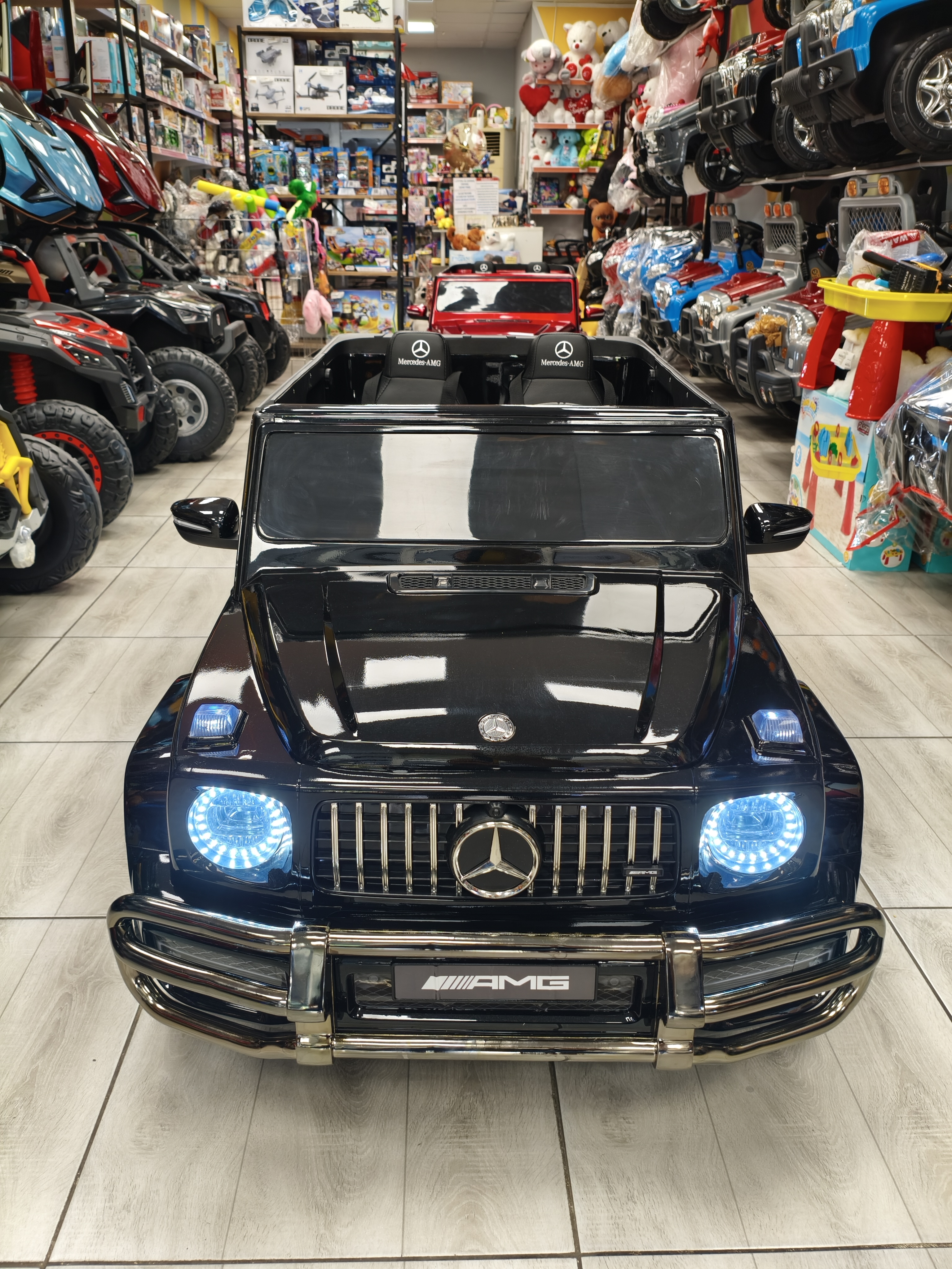 MERCEDES AMG G63 ÇİFT KİŞİLİK 24 VOLT TABLETLİ AKÜLÜ ARABA 
